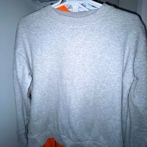 Light Grey Woman’s Crewneck Size S- Fits True to Size.